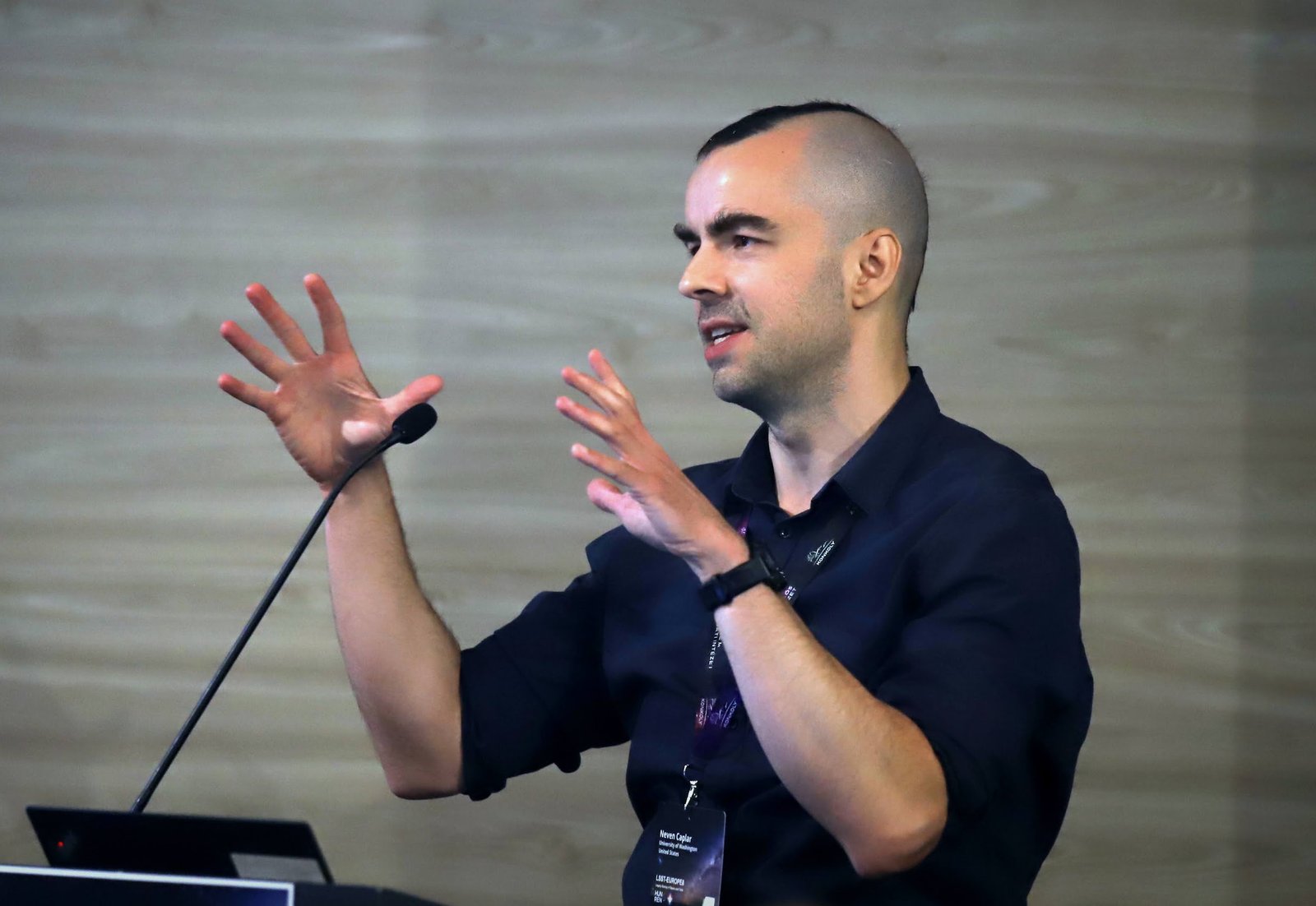 Neven Caplar giving a talk